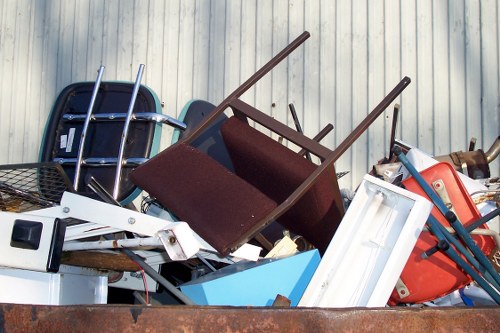 Recycling center handling old furniture