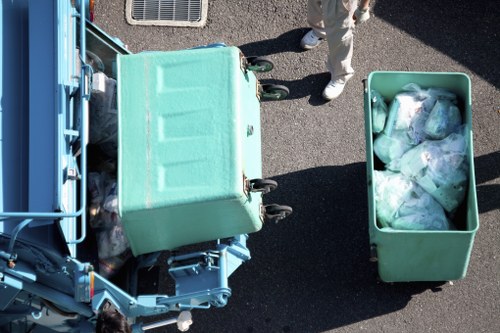 Recycling and waste containment being organised for safe disposal